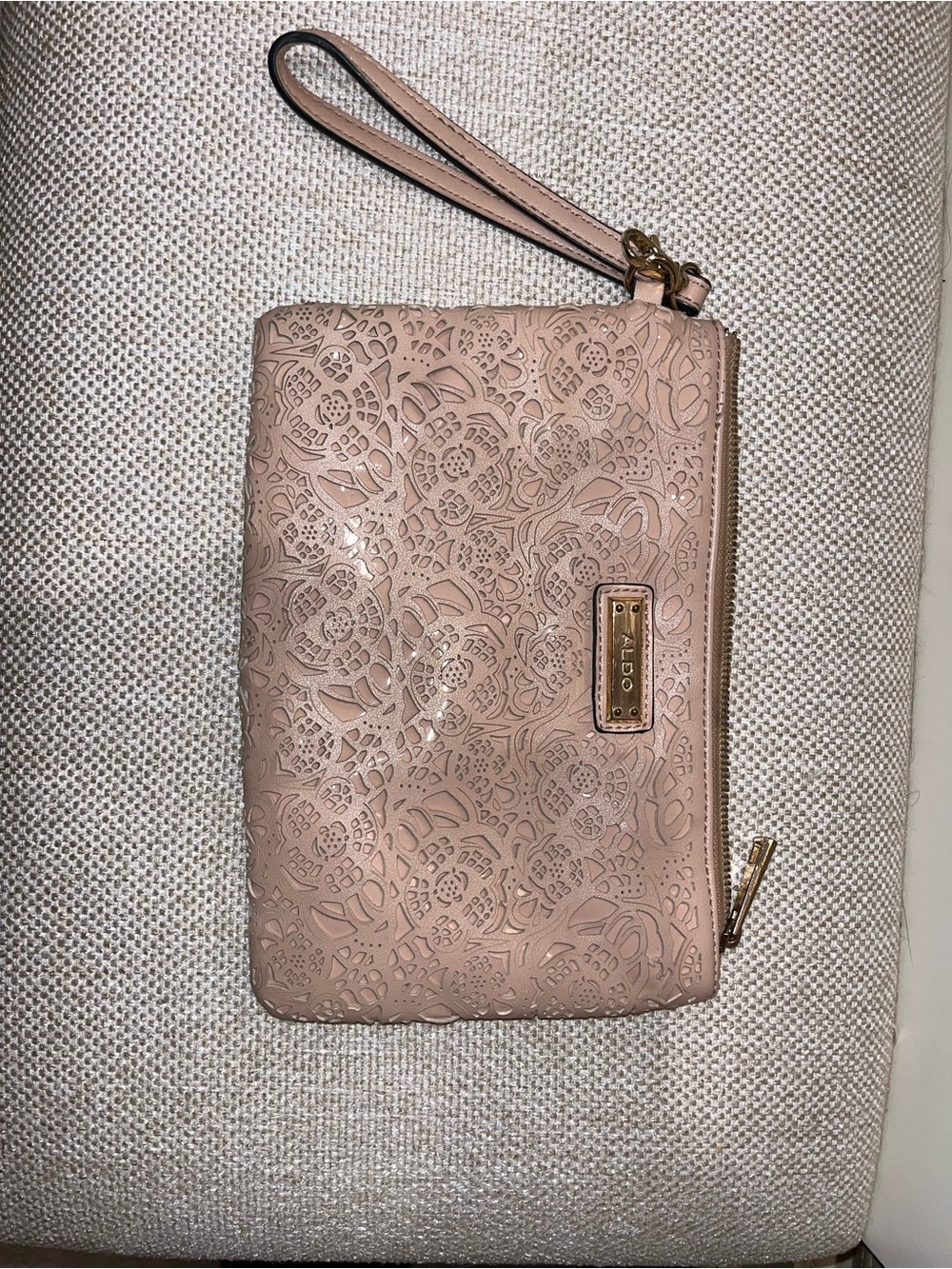 ALDO Blush Pink Laser-Cut Floral Wristlet with Gold Accent